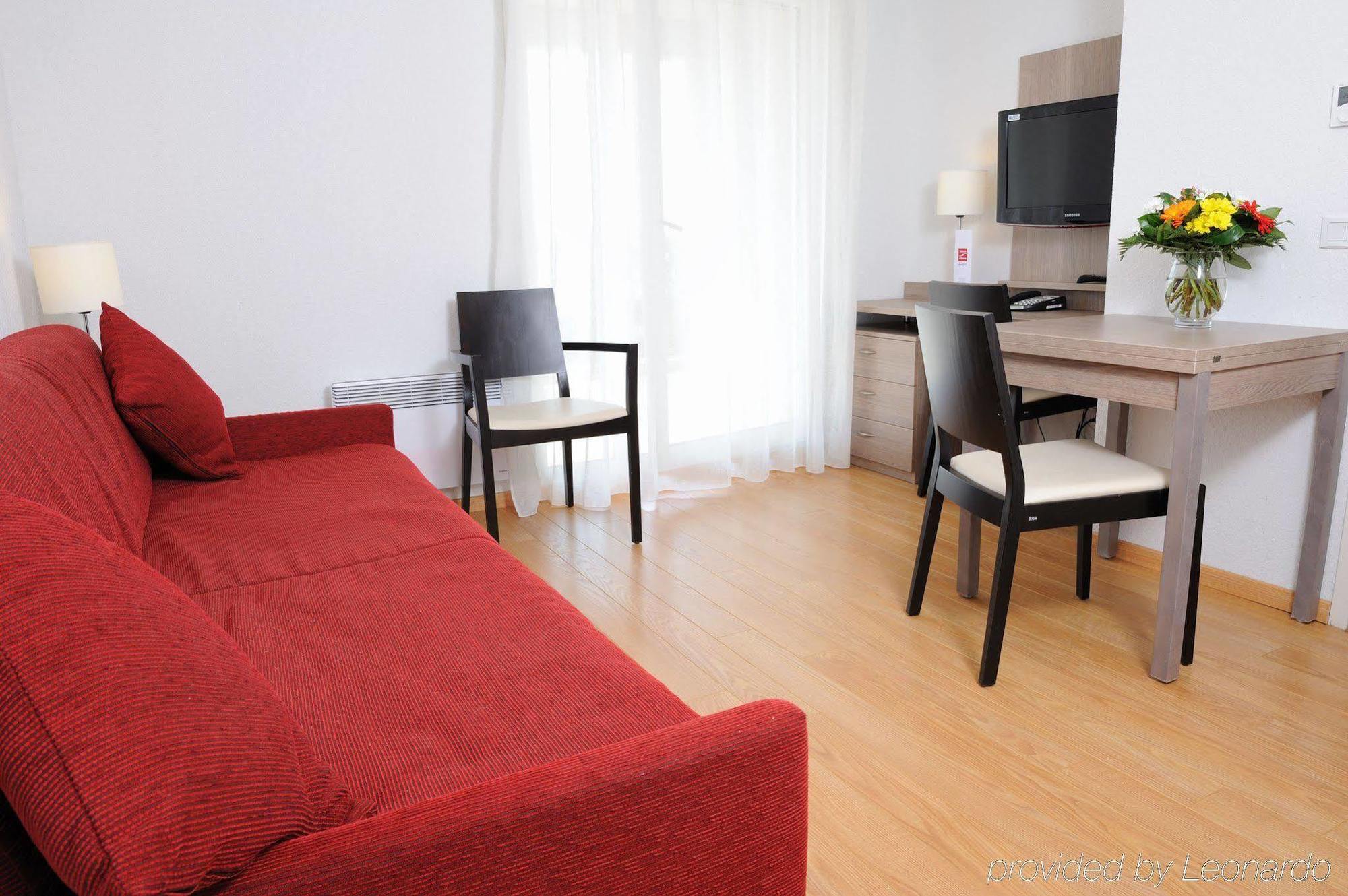 Aparthotel Sejours & Affaires Geneve Gex Les Rives Du Leman Zimmer foto